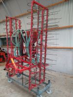 Striegel Lely mit Krummenacher Sähgerät