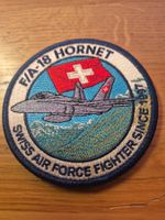 badge de l'armée suisse, motif F/A-18 Hornet.