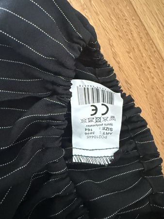 Stoffhose schwarz mit Nadelstreifen Grösse 164