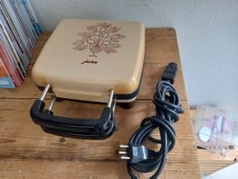 Jura Bretzeleisen type 141 mit neue Kochplatten