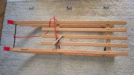 Holzschlitten