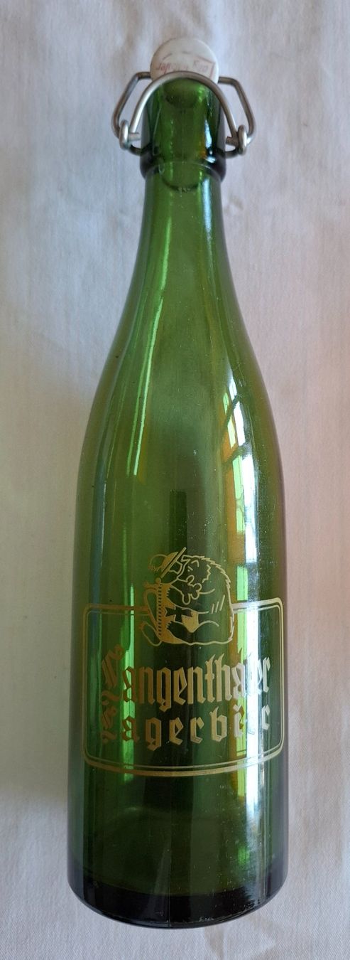 Bicchieri, Caraffe & Bottiglie: Bierflasche Langenthaler Lagerbier ca. 1954 – Usato da Wil SG venduto da Clanx