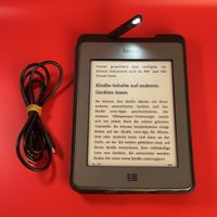 Amazon Kindle Touch (4. Gen) mit Lighted Leather Cover & MP3