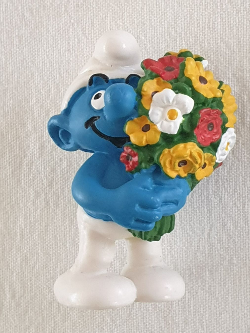 Schleich Statuette: Schlumpf mit Blumenstrauss – Usato da Mörschwil venduto da spirspi
