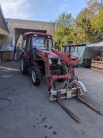 Traktor YTO554 mit Frontlader und Heckbagger