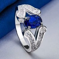 Eleganter Ring mit blauem Zirkonia, 925 versilbert, Gr. 8