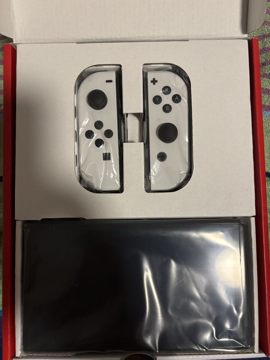 Nintendo Consoles: Switch OLED neuwertig  – Neuf (Voir description) à St. Gallen par sudovimfstab 1