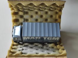 MAN TG-M LKW Nahverkehr 2achs mit Ladebrücke Von Conrad 1/50
