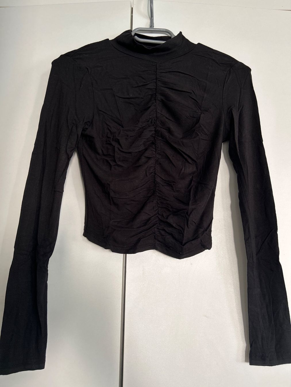 Top: Schickes, schwarzes Langarmshirt Stehkragen – Usato da Buttisholz venduto da allule13