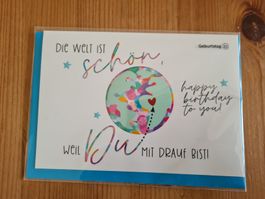 Geburtstagskarte "Die Welt ist schön weil Du drauf bist"