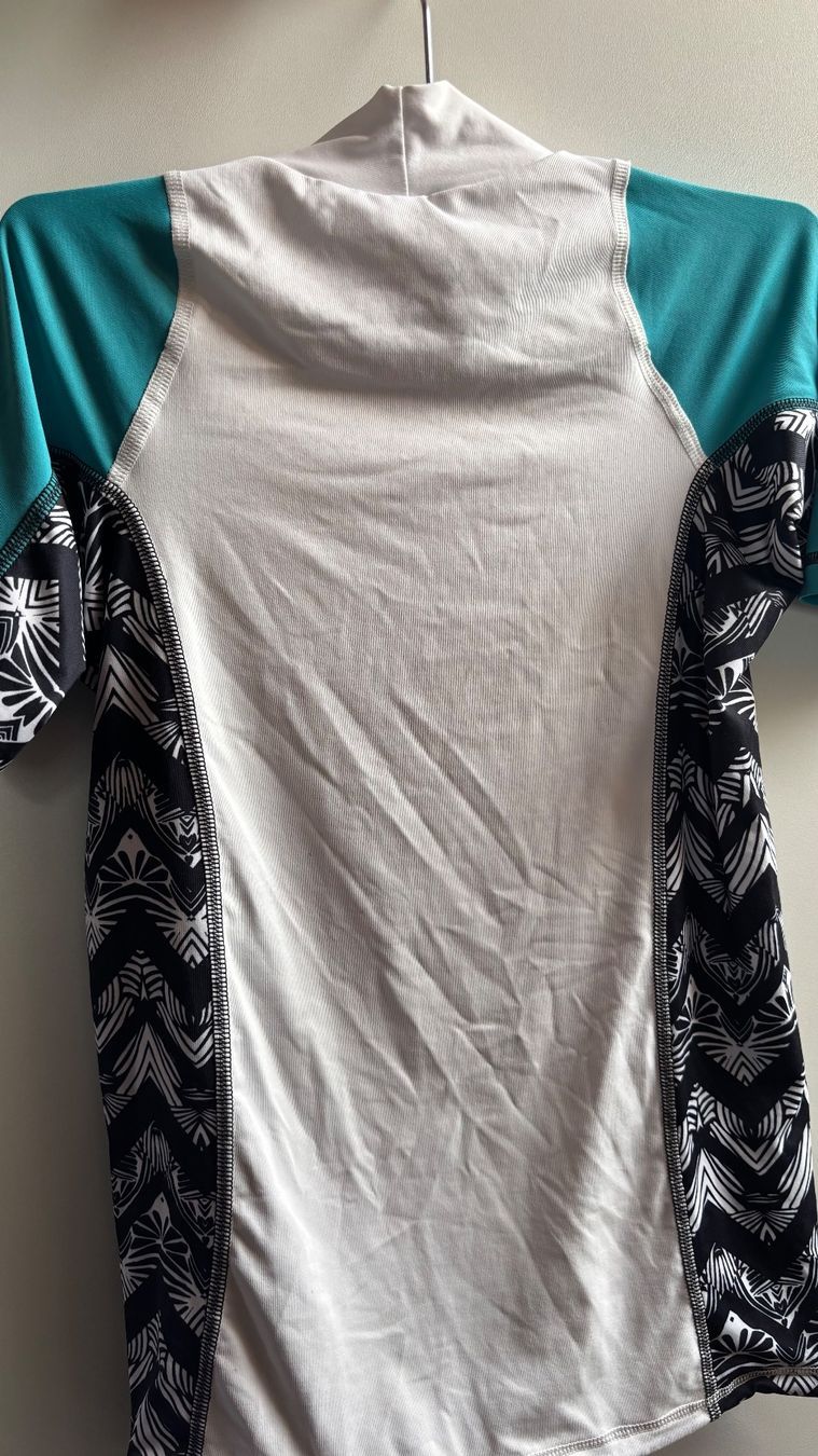 Costumi da bagno & Bikini: OLAIAN UV Shirt – Usato da Birmenstorf AG venduto da sar_7jtc 3