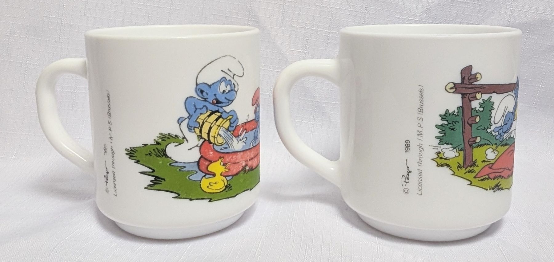 Tazze: 2er Set Vintage Arcopal Schlumpf Tasse - Mug – Nuovo (secondo la descrizione) da Wängi venduto da ABIZONE-86 1