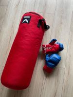 Boxsack mit Boxhandschuhen