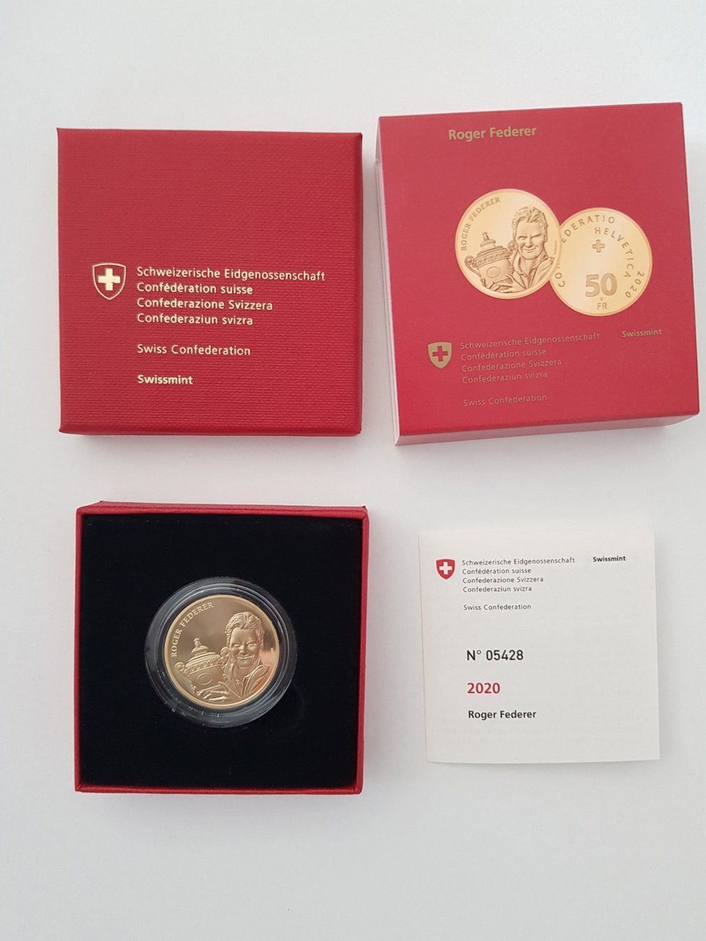 Tutti le monete: Roger Federer 50 Fr. Gold Münze – Nuovo e nell'imballaggio originale da Zürich venduto da Dr.Moony