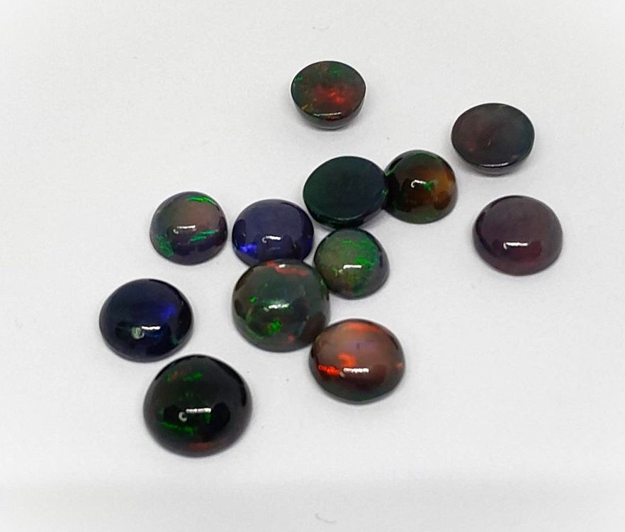 Promo 2x Opales noires 7 mm Valeur 160 Fr (Neuf (Voir description