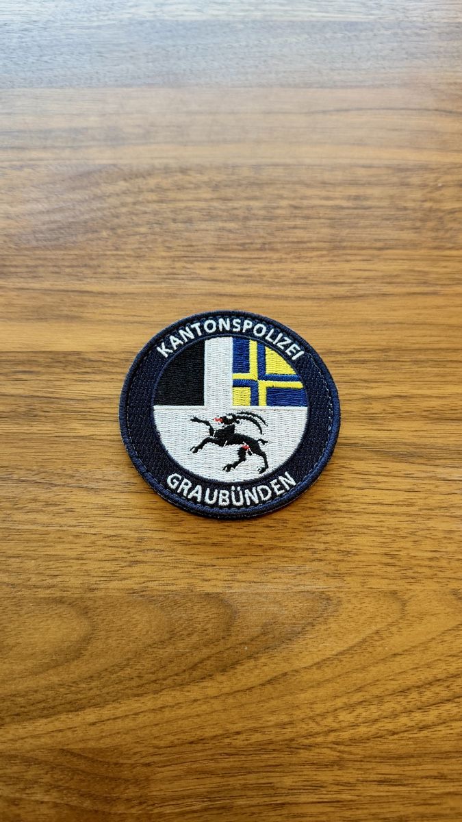 Placchette & Badge: Patch Kantonspolizei Graubünden – Nuovo e nell'imballaggio originale da Männedorf venduto da MGB