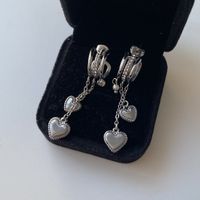 Silberne Edelstahl Herz und Perle Ohrringe