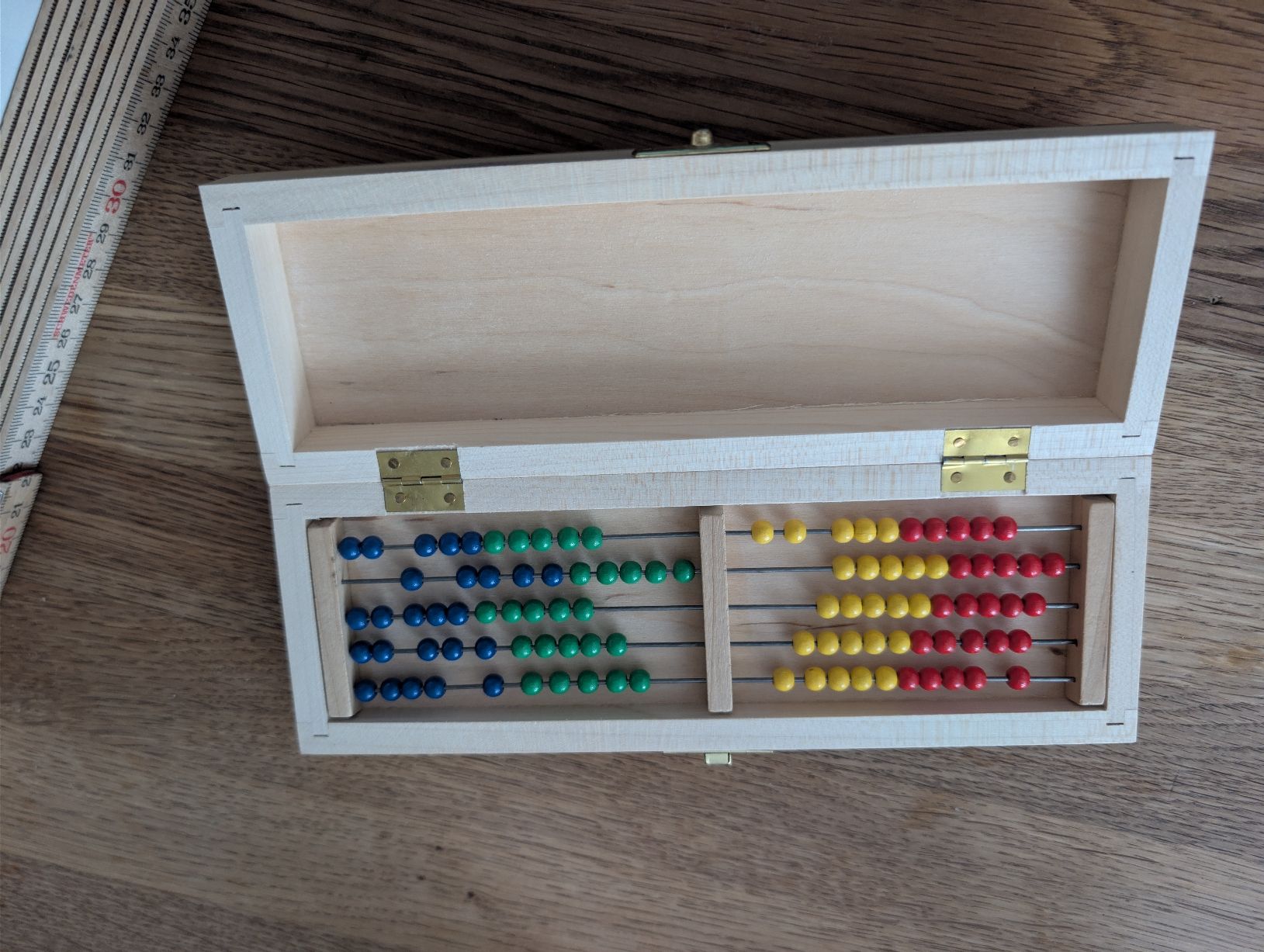 Articoli in legno: Aufbewahrungsbox mit Abakus  – Usato da Bern venduto da berneroberlaenderin 2