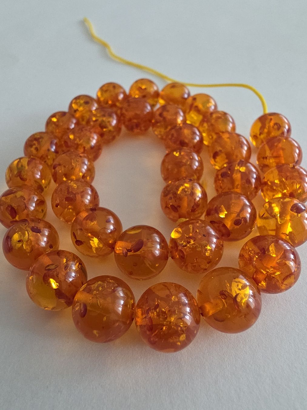 Minerali & Pietre curative: Bernstein 12mm. gelb/orange Strang – Nuovo e nell'imballaggio originale da Menziken venduto da Mirager