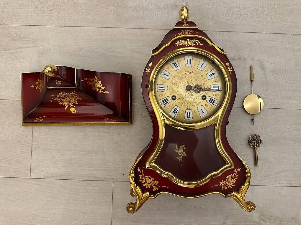 Uhren: Pendel-Uhr von Le Castel (Wanduhr) – Gebraucht aus Lostorf von Tenet88