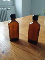 Lot 2 flacons de pharmacie vintage 100 ml.