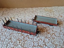 Märklin HO - 2 Flachwagen mit Rungen