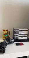PS2 inkl. Legendäre Spiele & Controller
