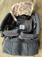 Babytrage Ergobaby mit Schmetterlingsmotiv