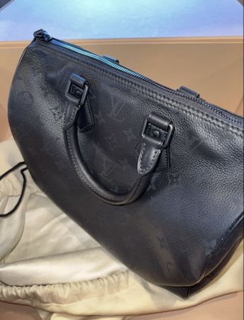 Louis Vuitton P9 30 in Schwarz