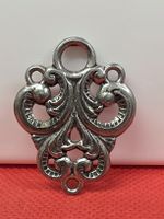 Anhänger Metall silberfarben Ornament-Design gebraucht