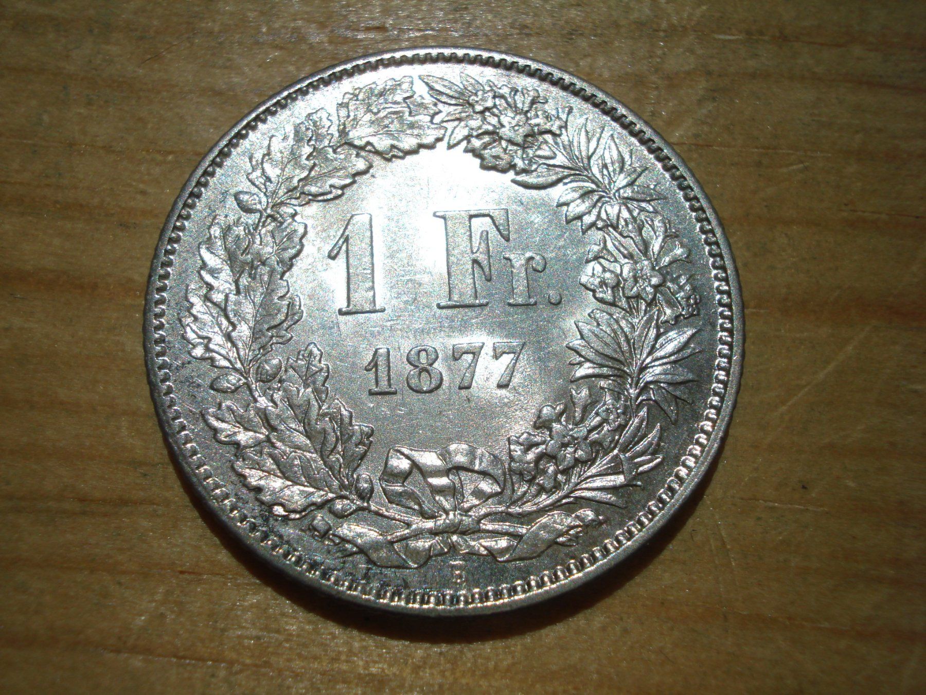 Alle Münzen: (H3) 1 Franken 1877 UNZ-STGL – Gebraucht aus Erlach von Net-Coins