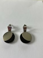 Boucles d’oreilles Lotus acier et carbone
