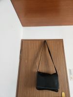 Sac bandoulière Longchamp cuir noir bon état