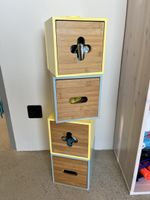 Vier bunte Holzboxen, ideal für Spielsachen & Deko