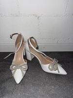 Elegante weisse Sandalen 