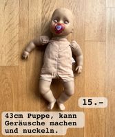 Spielpuppe 43 cm mit Soundfunktion und Schnuller gebraucht