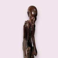 African wood carving statue