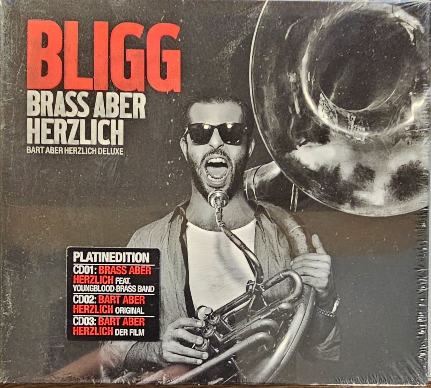 CDs: Bligg – Brass Aber Herzlich – Neuf avec emballage d'origine à Wahlen b. Laufen par Cg10