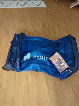 neuer duffel 90l roller deuter