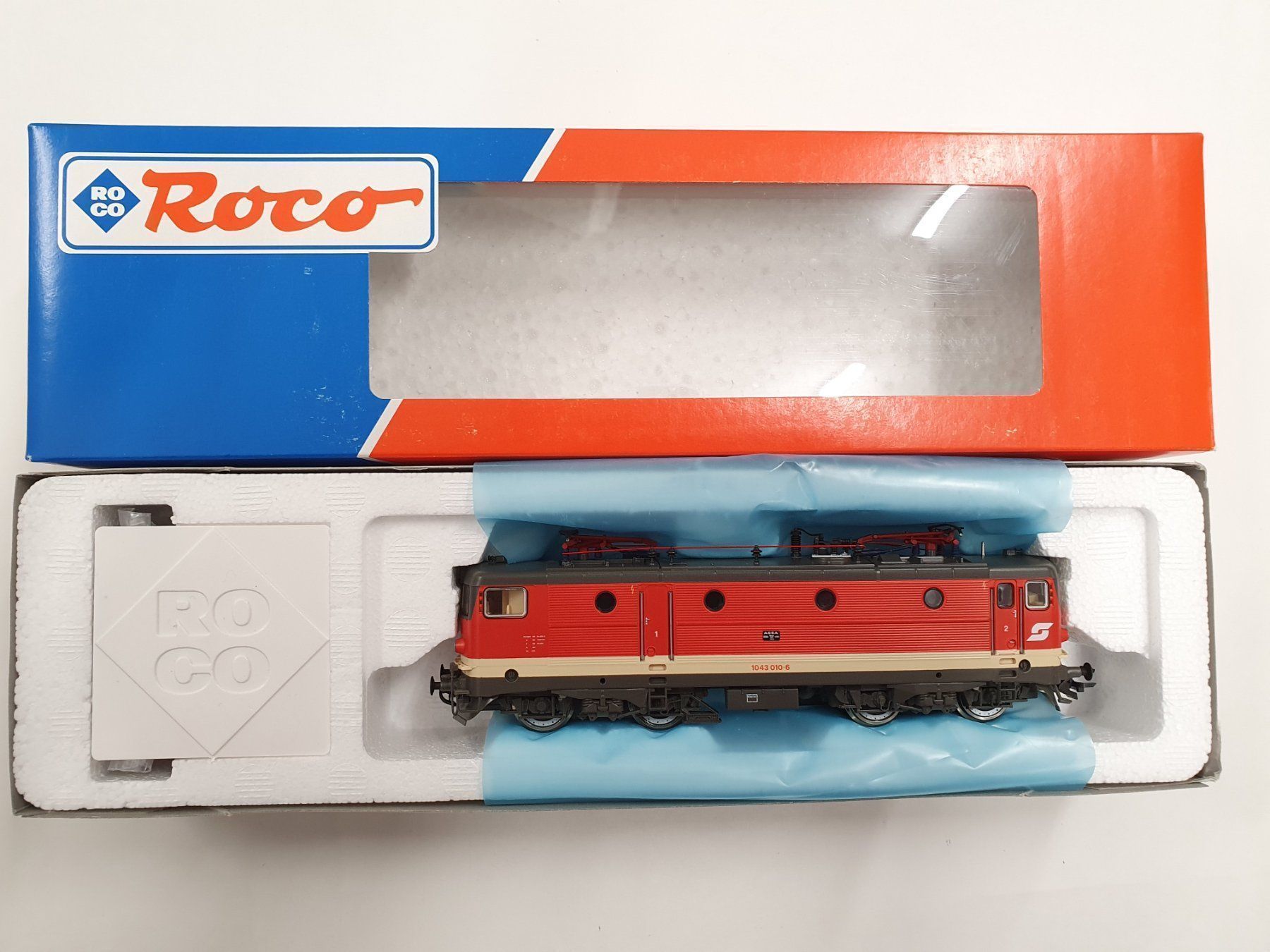 Roco Modellini di ferrovie: Roco 63761 ÖBB 1043 010-6 – Nuovo e nell'imballaggio originale da Würenlos venduto da juruth