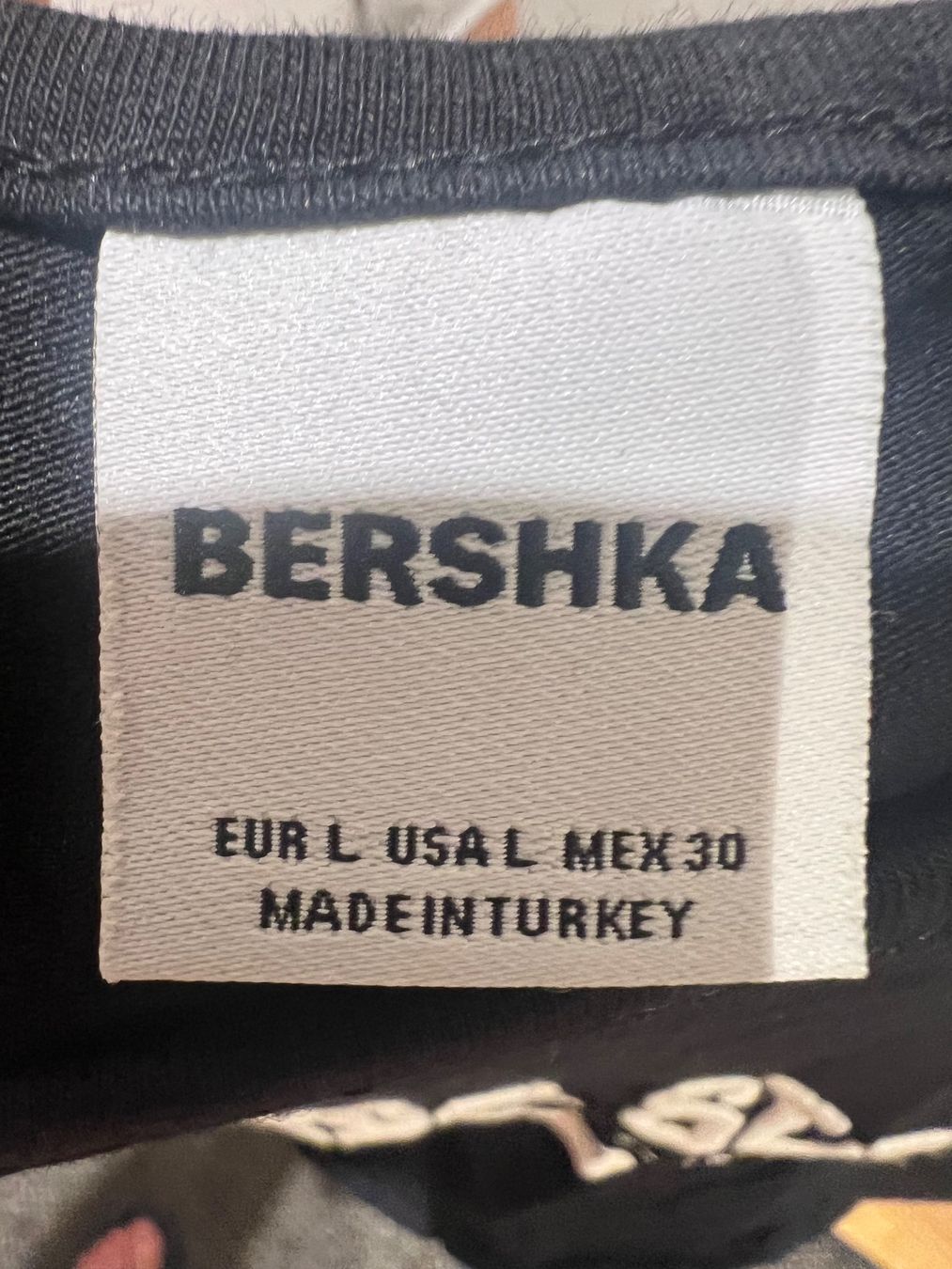 Bershka Top: Schwarzes Bershka Top "Florida Sunset" Grösse L – Usato da Bottenwil venduto da topshop 1