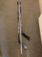 Zwei Eishockeyschläger Reebook Multilam MS + 2 Pucks