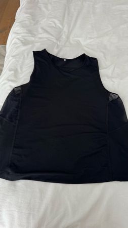 H&M Move Sporttop schwarz Grösse L guter Zustand