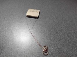 Kette mit Anhänger Ringe, goldfarbig