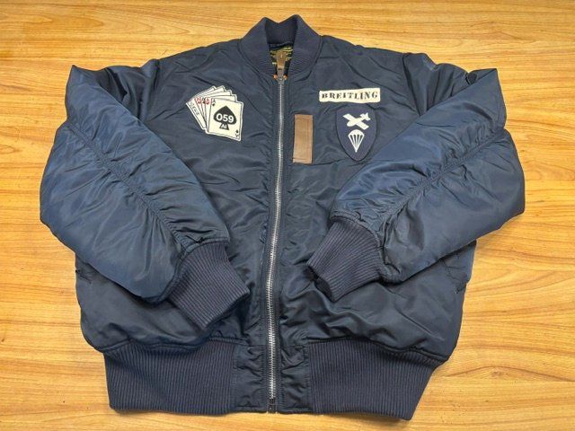 Alpha Industries Jacken: Breitling Alpha Industries Bomberjacke Daunenjacke – Neu und originalverpackt aus Grenchen von chaga1234