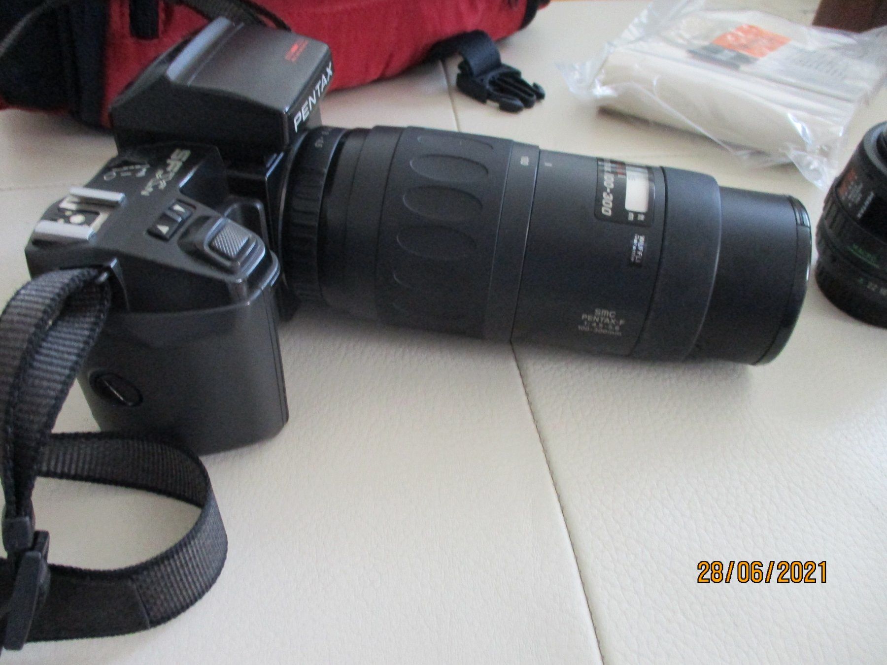 Pentax Fotocamera: Pentax SFxN Analog Kamera mit Zubehör – Usato da Liestal venduto da Disc-Point 7