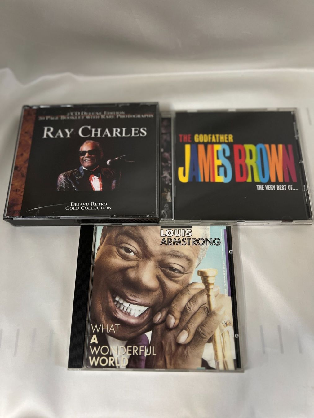 CD: CD-Sammlung: Ray Charles, James Brown, Louis Armstrong – Usato da Zürich venduto da Drahtzug