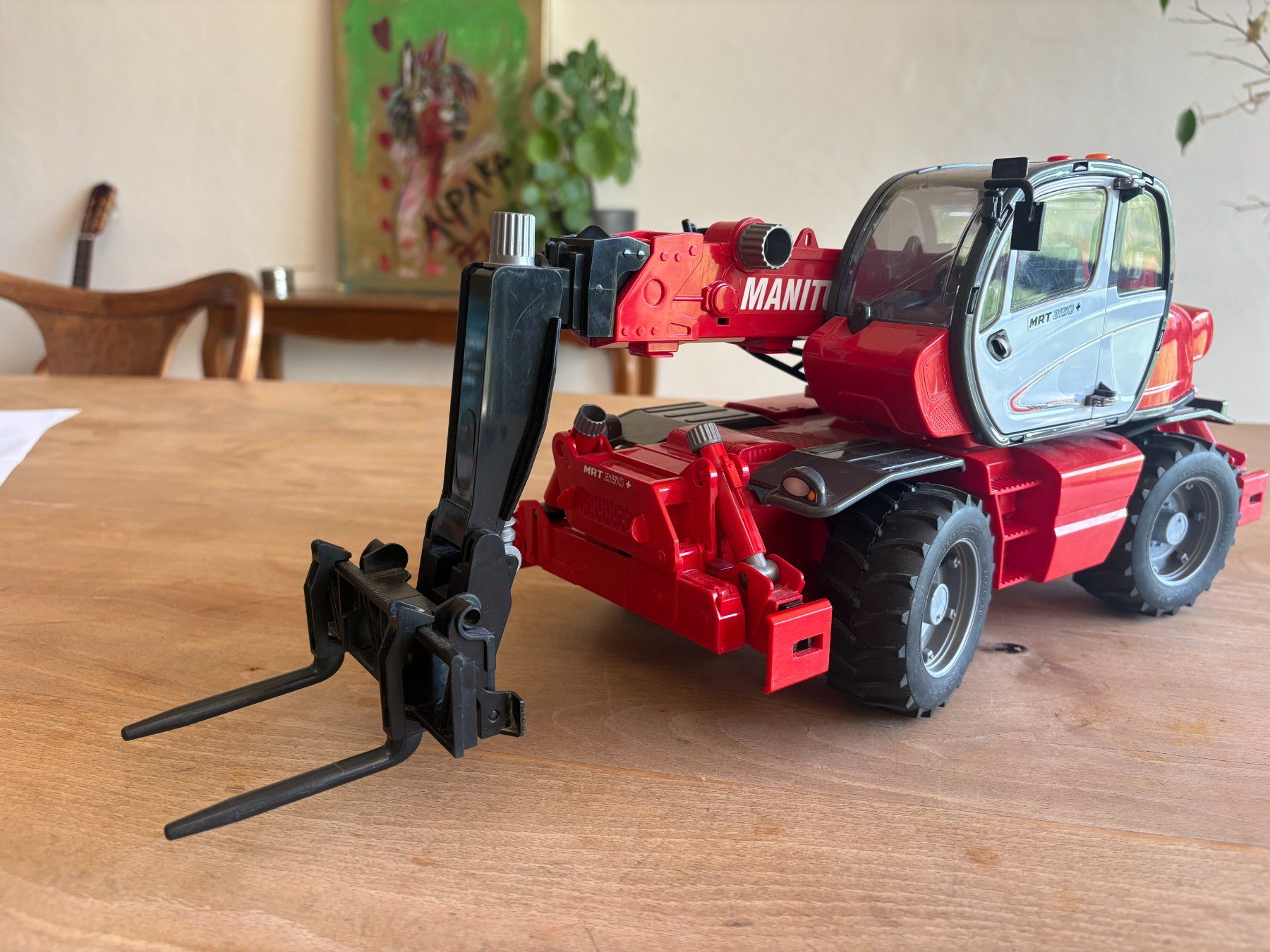 Bruder Giocattoli: Bruder Manitou Teleskopstapler MRT 2150 gebraucht – Usato da Gysenstein venduto da Kanban 1