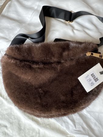 Tasche felloptik neu