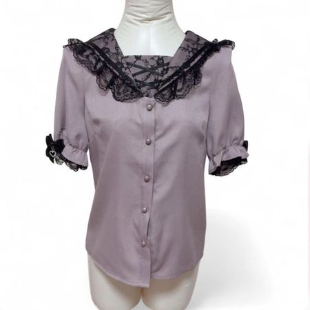 Purple lace blouse with black bow details
